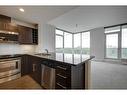 802-55 Spruce Place Sw, Calgary, AB  - Indoor Photo Showing Kitchen With Double Sink With Upgraded Kitchen 