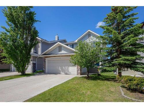43 Cougarstone Common Sw, Calgary, AB - Outdoor With Facade