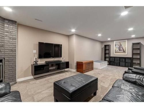 3423 Bowmanten Place Nw, Calgary, AB - Indoor With Fireplace