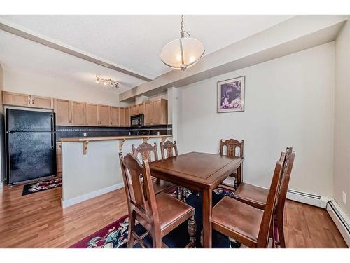 2214-211 Aspen Stone Boulevard Sw, Calgary, AB - Indoor Photo Showing Dining Room