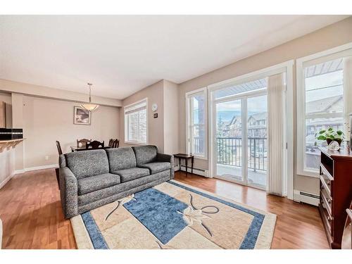 2214-211 Aspen Stone Boulevard Sw, Calgary, AB - Indoor Photo Showing Living Room