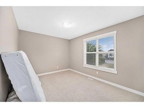 695 New Brighton Drive Se, Calgary, AB - Indoor Photo Showing Other Room