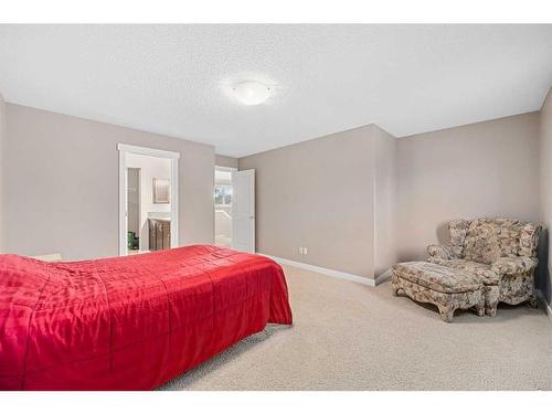 695 New Brighton Drive Se, Calgary, AB - Indoor Photo Showing Bedroom