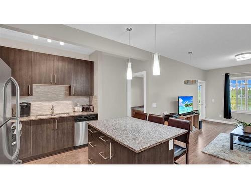 206-4 Sage Hill Terrace Nw, Calgary, AB - Indoor Photo Showing Kitchen With Stainless Steel Kitchen