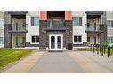 206-4 Sage Hill Terrace Nw, Calgary, AB  - Outdoor With Facade 