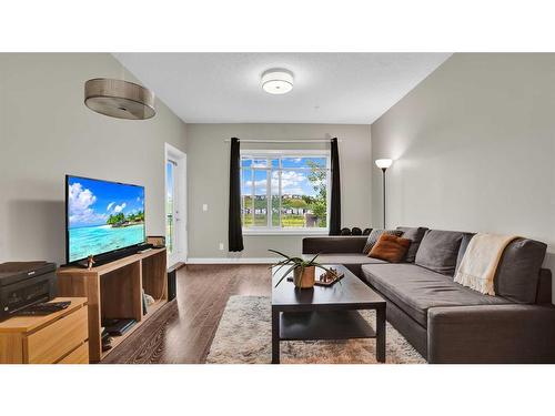 206-4 Sage Hill Terrace Nw, Calgary, AB - Indoor Photo Showing Living Room