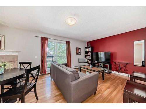 401-1027 1 Avenue Nw, Calgary, AB - Indoor Photo Showing Living Room