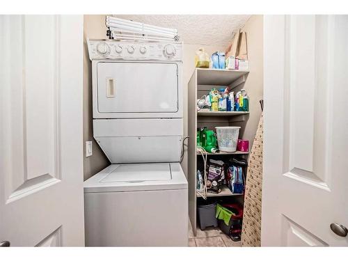 401-1027 1 Avenue Nw, Calgary, AB - Indoor Photo Showing Laundry Room