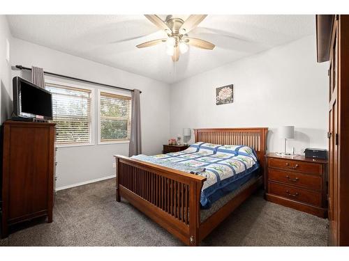 101-15212 Bannister Road Se, Calgary, AB - Indoor Photo Showing Bedroom