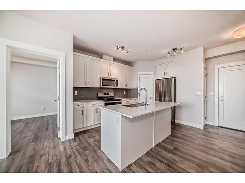 209-500 Auburn Meadows Common Se, Calgary, AB - Indoor Photo Showing Kitchen With Stainless Steel Kitchen