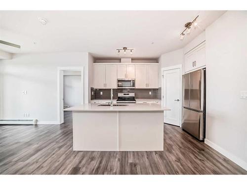 209-500 Auburn Meadows Common Se, Calgary, AB - Indoor Photo Showing Kitchen With Double Sink