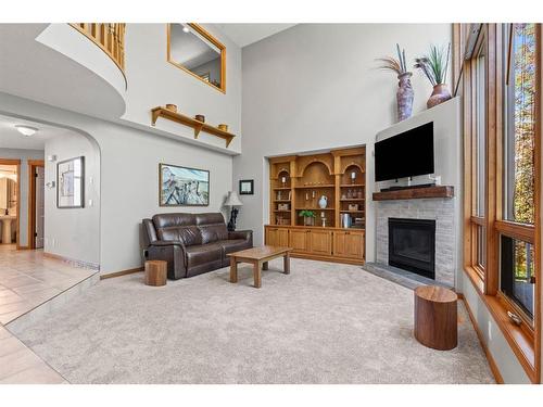 170 Valley Glen Heights Nw, Calgary, AB - Indoor With Fireplace