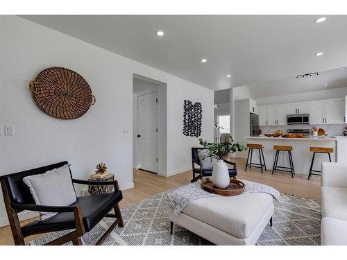 16 Hawktree Close Nw, Calgary, AB - Indoor Photo Showing Living Room