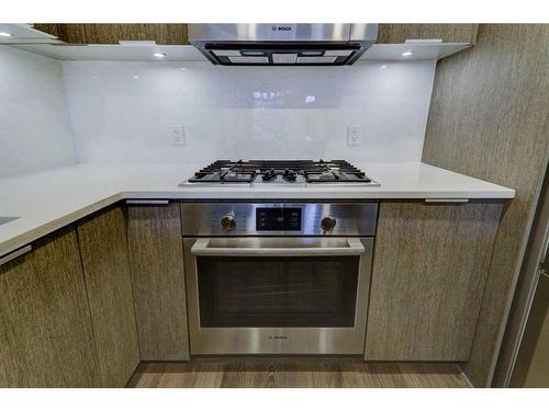 222-823 5 Avenue Nw, Calgary, AB - Indoor Photo Showing Kitchen