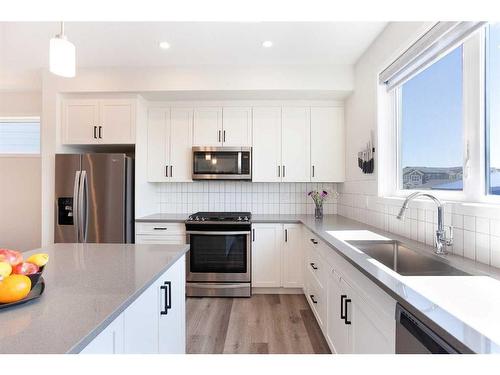 51 Magnolia Way Se, Calgary, AB - Indoor Photo Showing Kitchen With Upgraded Kitchen
