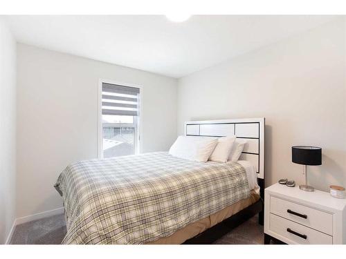 51 Magnolia Way Se, Calgary, AB - Indoor Photo Showing Bedroom