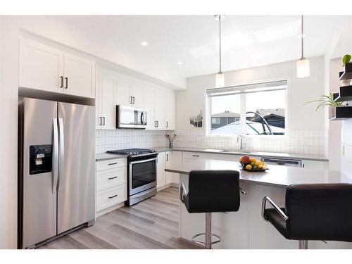 51 Magnolia Way Se, Calgary, AB - Indoor Photo Showing Kitchen With Upgraded Kitchen