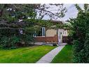 363 Woodvale Crescent Sw, Calgary, AB  - Outdoor 