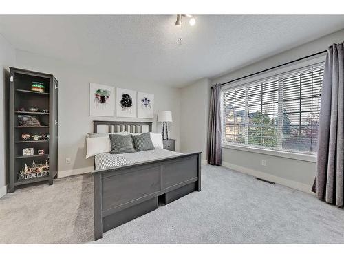 12-11 Scarpe Drive Sw, Calgary, AB - Indoor Photo Showing Bedroom