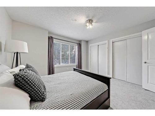 12-11 Scarpe Drive Sw, Calgary, AB - Indoor Photo Showing Bedroom