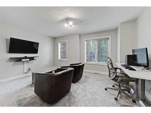 12-11 Scarpe Drive Sw, Calgary, AB - Indoor Photo Showing Bedroom