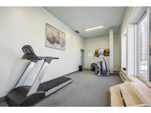 210-310 8 Street Sw, Calgary, AB - Indoor Photo Showing Gym Room