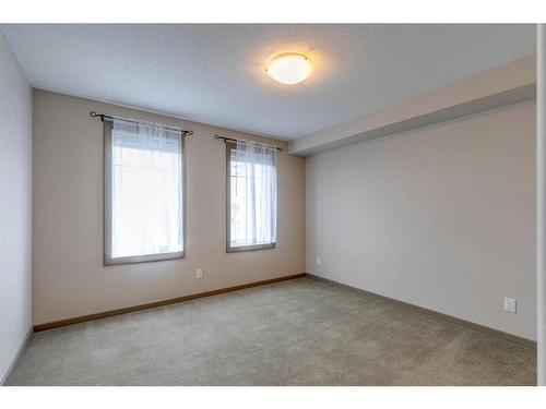 1310-310 Mckenzie Towne Gate Se, Calgary, AB - Indoor Photo Showing Other Room