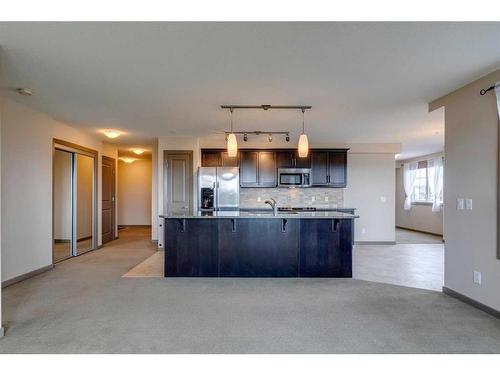 1310-310 Mckenzie Towne Gate Se, Calgary, AB - Indoor Photo Showing Kitchen