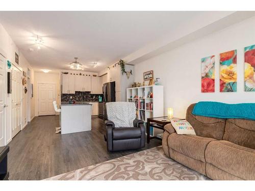 4412-215 Legacy Boulevard Se, Calgary, AB - Indoor Photo Showing Living Room