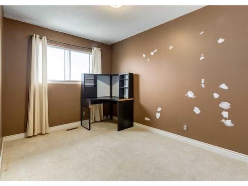6144 Maddock Drive Ne, Calgary, AB - Indoor Photo Showing Other Room