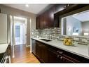 209-819 4A Street Ne, Calgary, AB  - Indoor Photo Showing Kitchen With Double Sink With Upgraded Kitchen 