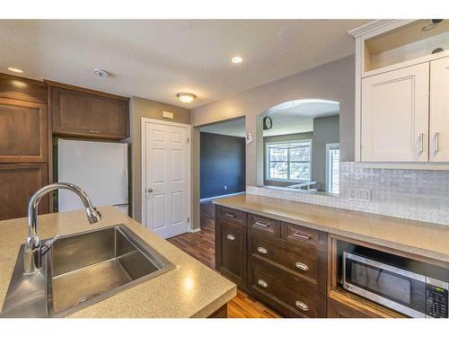 220 Covehaven Road Ne, Calgary, AB - Indoor Photo Showing Kitchen With Double Sink