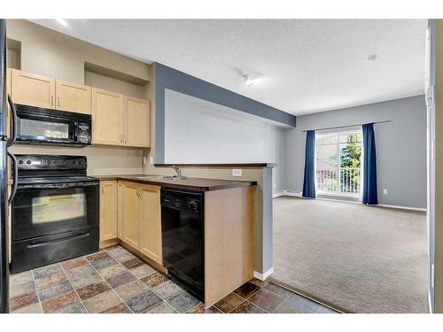 8304-70 Panamount Drive Nw, Calgary, AB - Indoor Photo Showing Kitchen With Double Sink