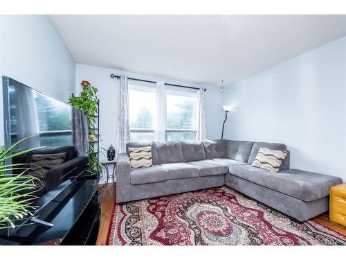 184 Whitaker Close Ne, Calgary, AB - Indoor Photo Showing Living Room