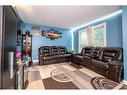 5217 Martin Crossing Drive Ne, Calgary, AB  - Indoor Photo Showing Living Room 