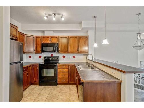 2236-48 Inverness Gate Se, Calgary, AB - Indoor Photo Showing Kitchen With Double Sink