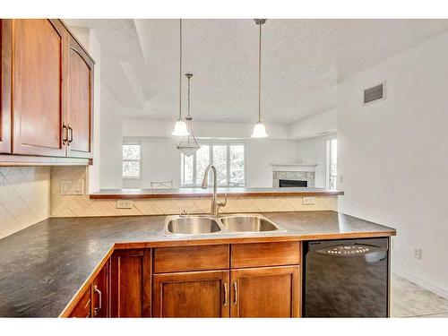 2236-48 Inverness Gate Se, Calgary, AB - Indoor Photo Showing Kitchen With Double Sink