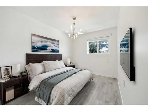 56 Erin Circle Se, Calgary, AB - Indoor Photo Showing Bedroom