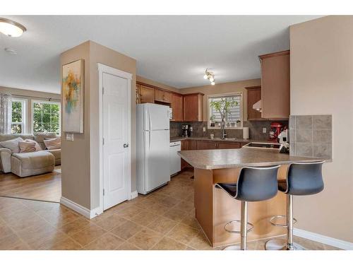 294 Covecreek Close Ne, Calgary, AB - Indoor Photo Showing Kitchen With Double Sink