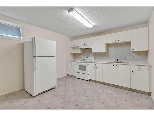 12739 Coventry Hills Way Ne, Calgary, AB - Indoor Photo Showing Kitchen With Double Sink