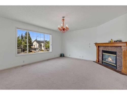 12739 Coventry Hills Way Ne, Calgary, AB - Indoor Photo Showing Living Room With Fireplace