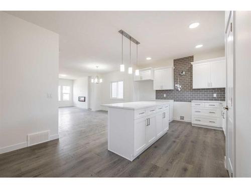 372 Heartland Way, Cochrane, AB - Indoor Photo Showing Kitchen With Upgraded Kitchen