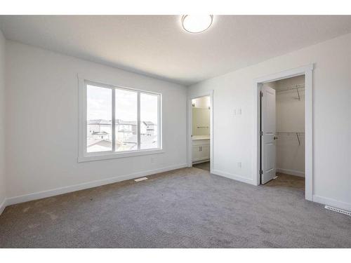 372 Heartland Way, Cochrane, AB - Indoor Photo Showing Other Room