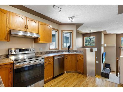 34 Covehaven Rise Ne, Calgary, AB - Indoor Photo Showing Kitchen With Double Sink