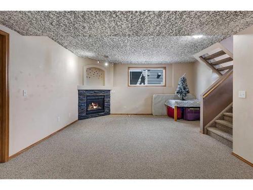 34 Covehaven Rise Ne, Calgary, AB - Indoor With Fireplace