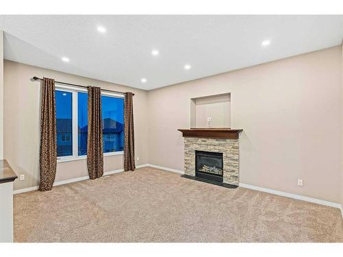 142 Silverado Bank Circle Sw, Calgary, AB - Indoor With Fireplace