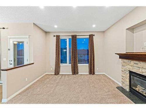 142 Silverado Bank Circle Sw, Calgary, AB - Indoor With Fireplace