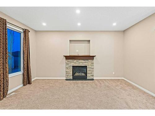 142 Silverado Bank Circle Sw, Calgary, AB - Indoor With Fireplace