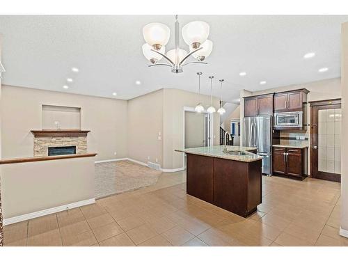 142 Silverado Bank Circle Sw, Calgary, AB - Indoor Photo Showing Kitchen With Upgraded Kitchen