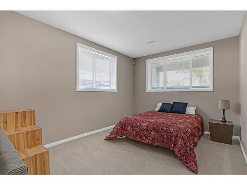 91 Evercreek Bluffs Place Sw, Calgary, AB - Indoor Photo Showing Bedroom